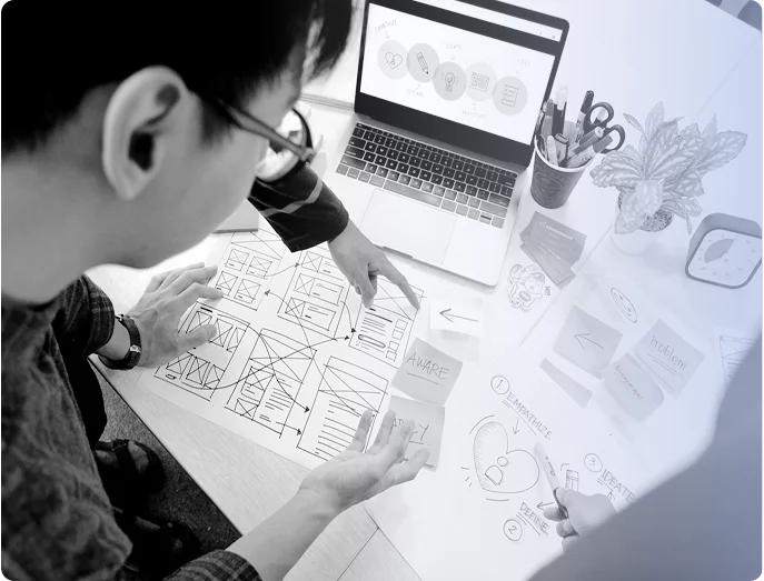 Team working on design thinking sketches